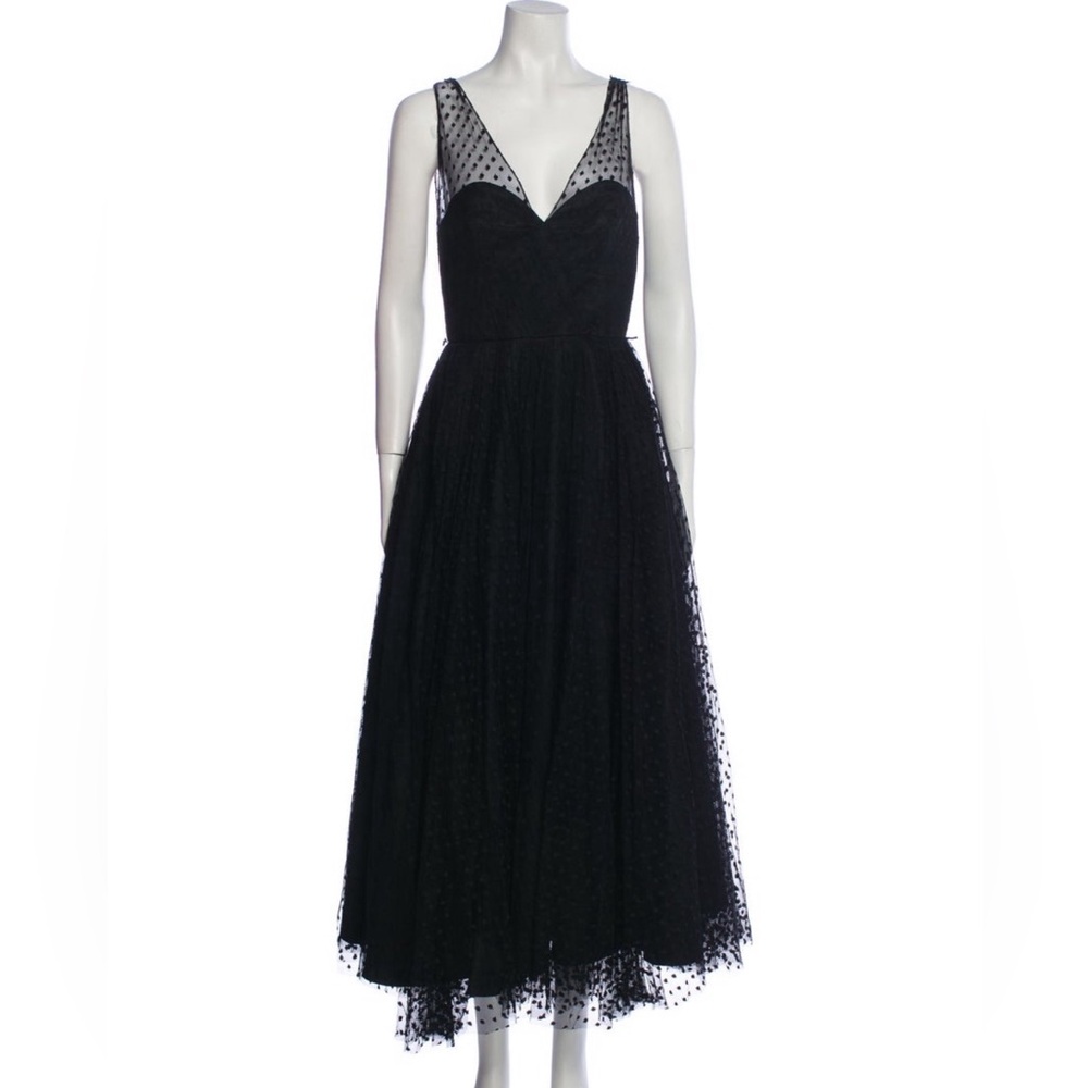 Cocktail dress with sheer polka dot overlay. Very retro vibe.